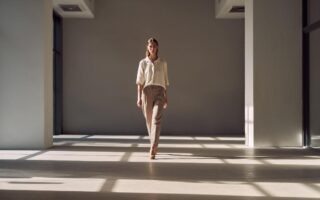 person walking forward with calm confidence